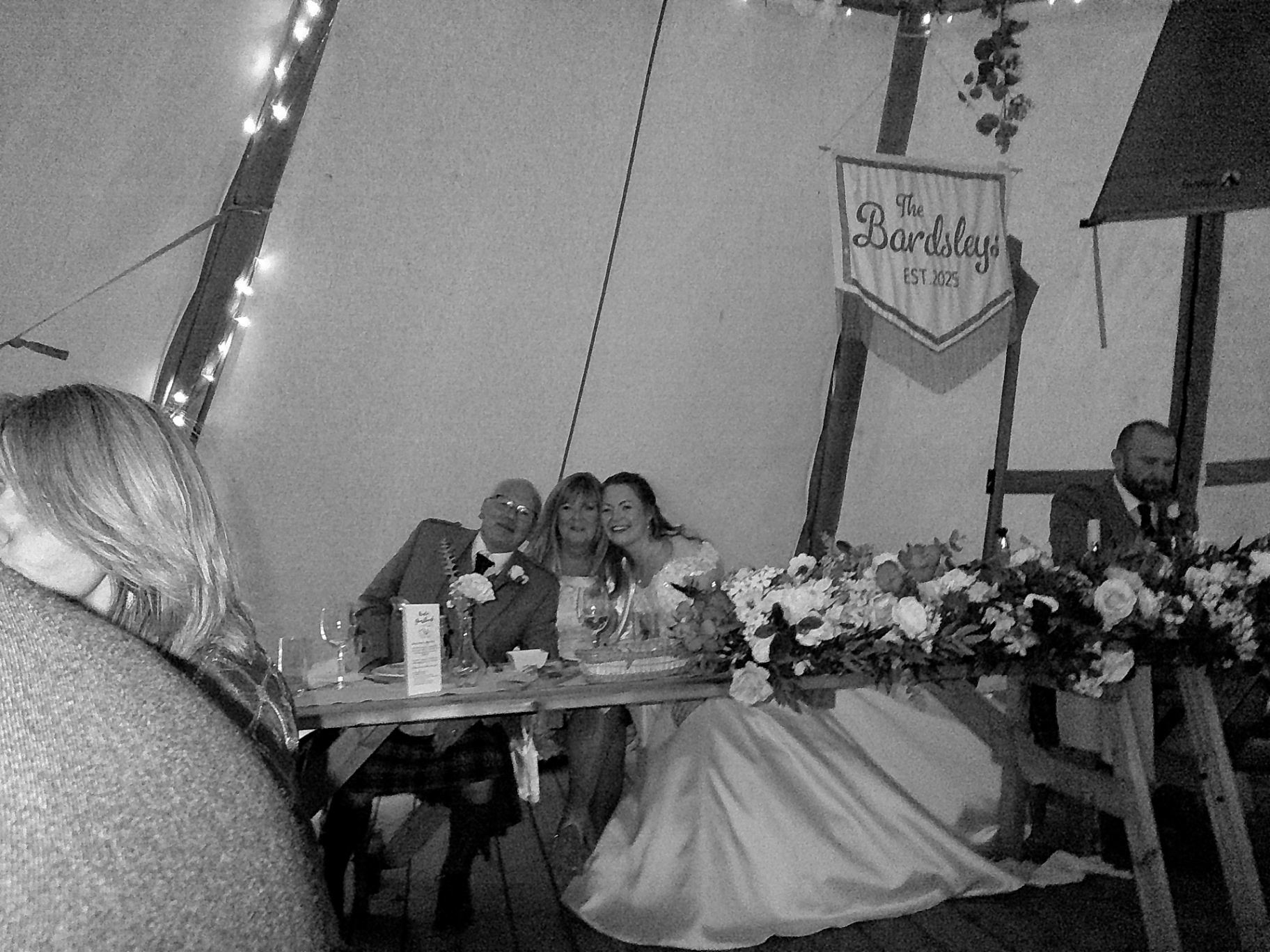 Top-table guests smiling at the wedding, shot on SnapBox
