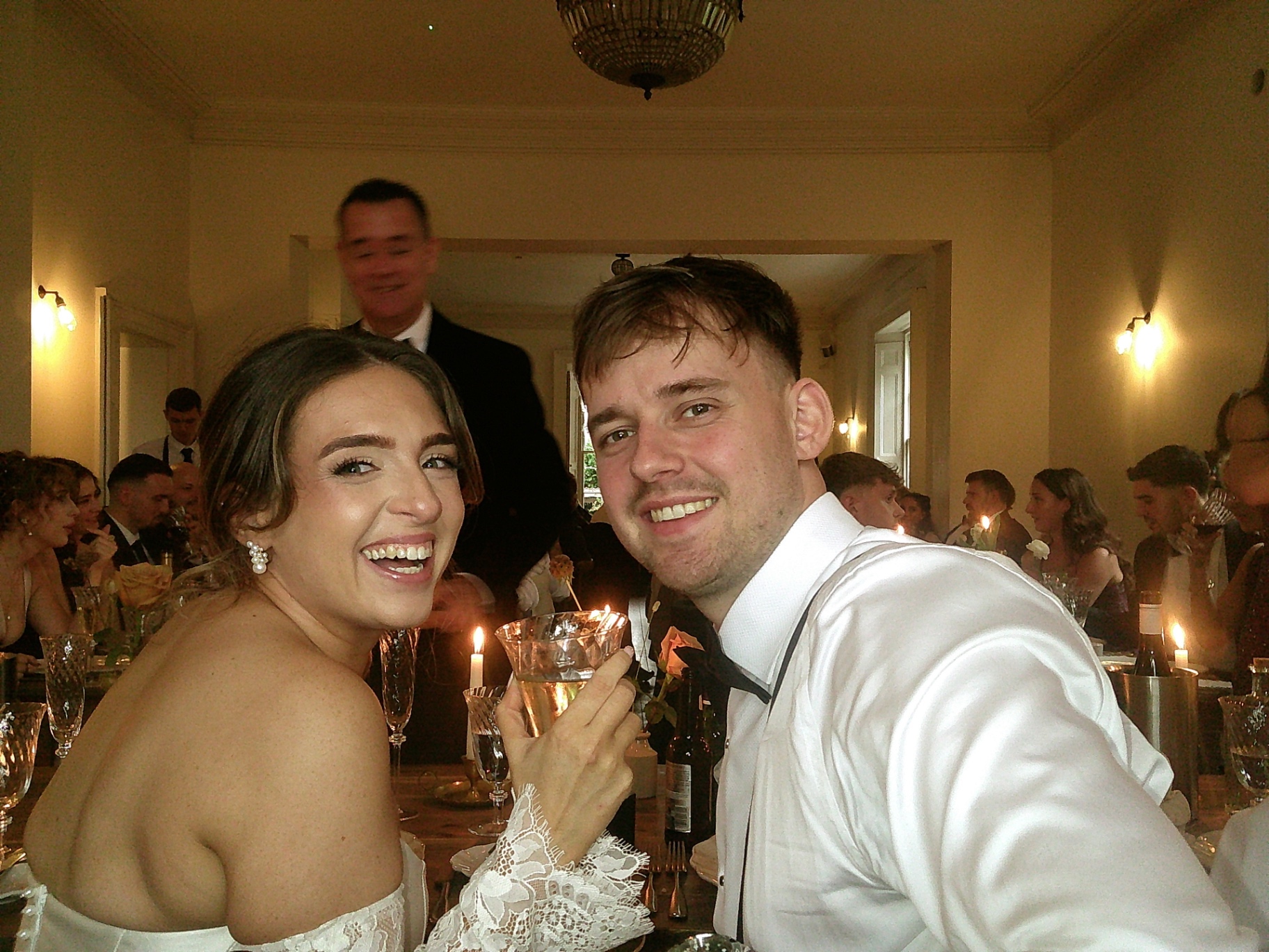 Bride and groom toasting at the table, shot on SnapBox