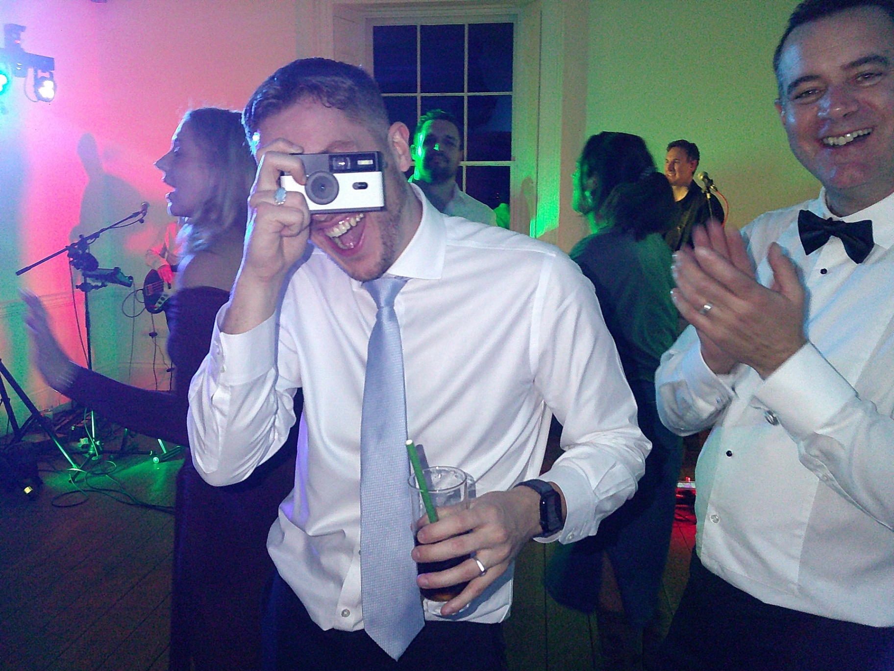 Guest snapping a photo on the dancefloor with SnapBox