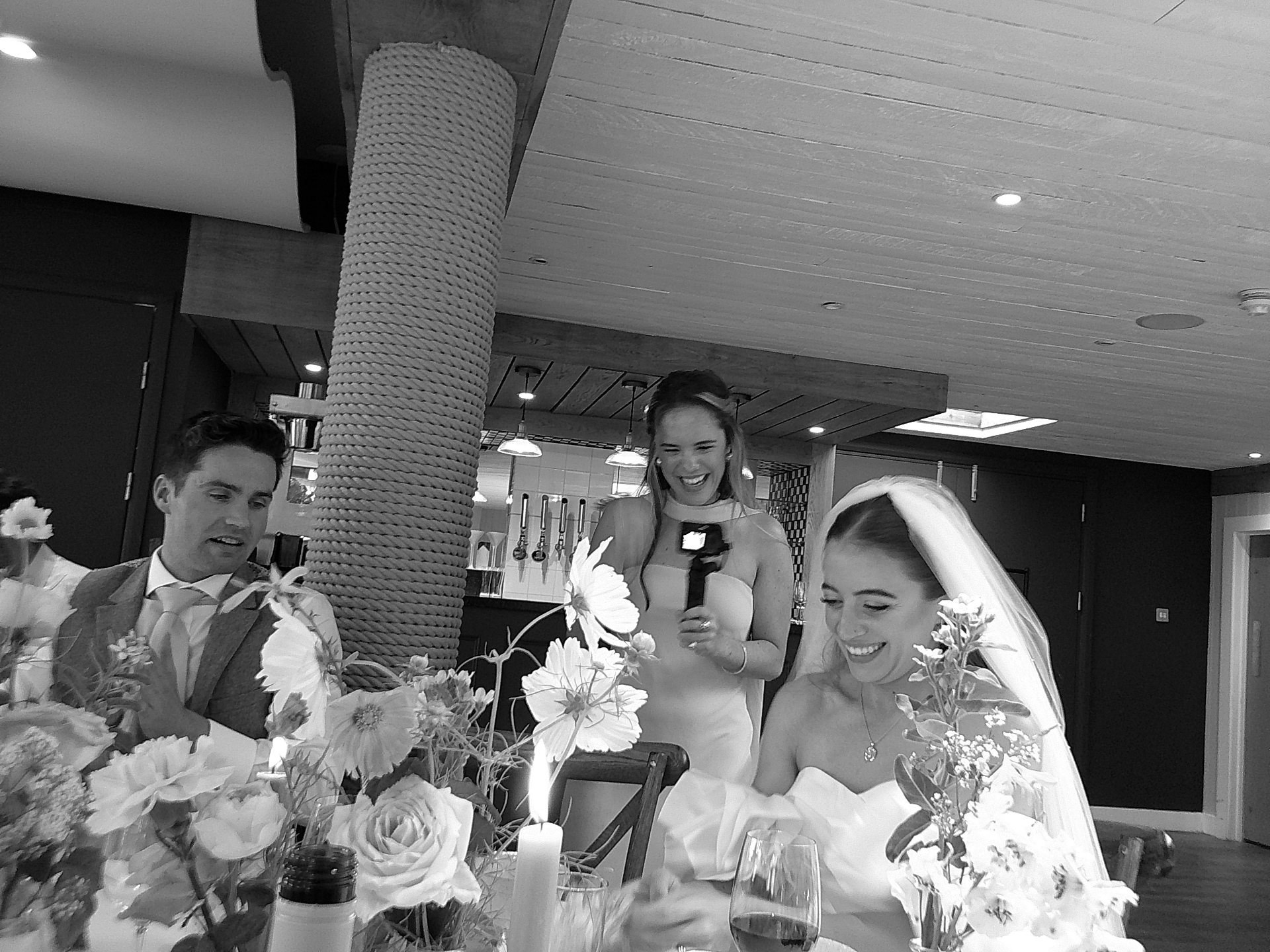 Bride and groom laughing during speeches, shot on SnapBox