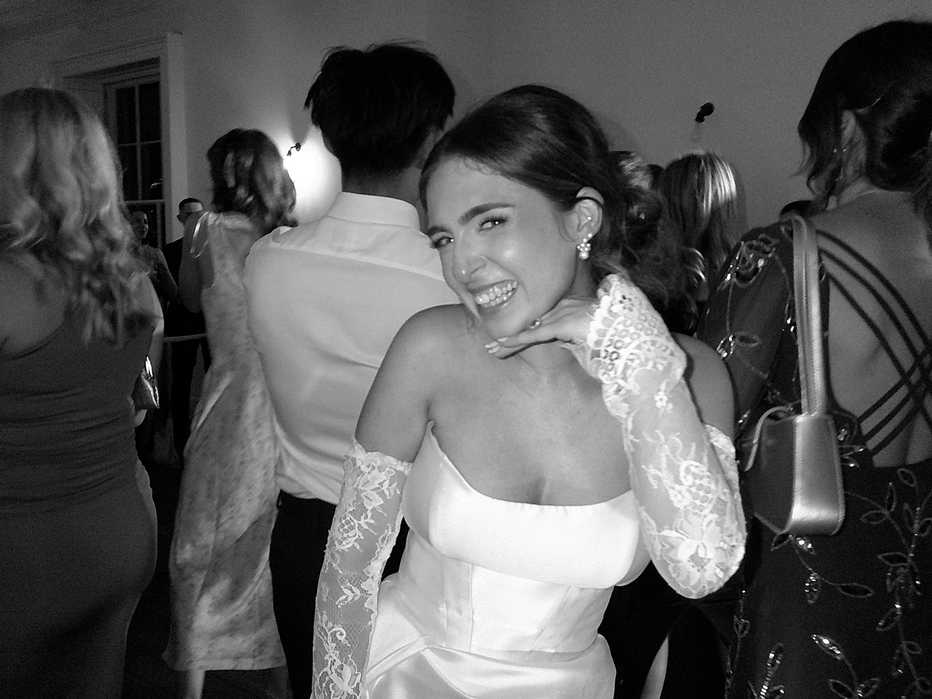Bride laughing on the dancefloor, shot on SnapBox